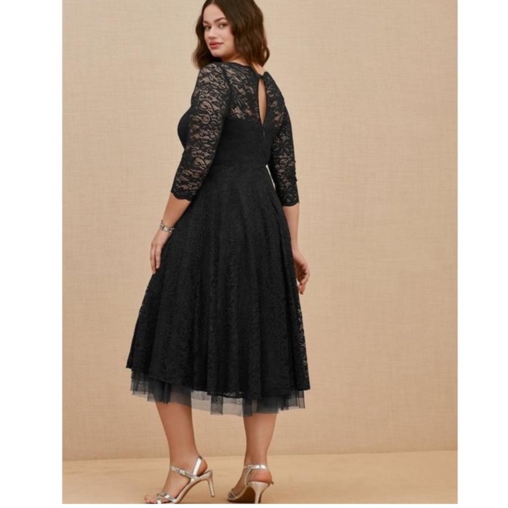 Black lace plus size wedding dress. Tags on. Never worn.